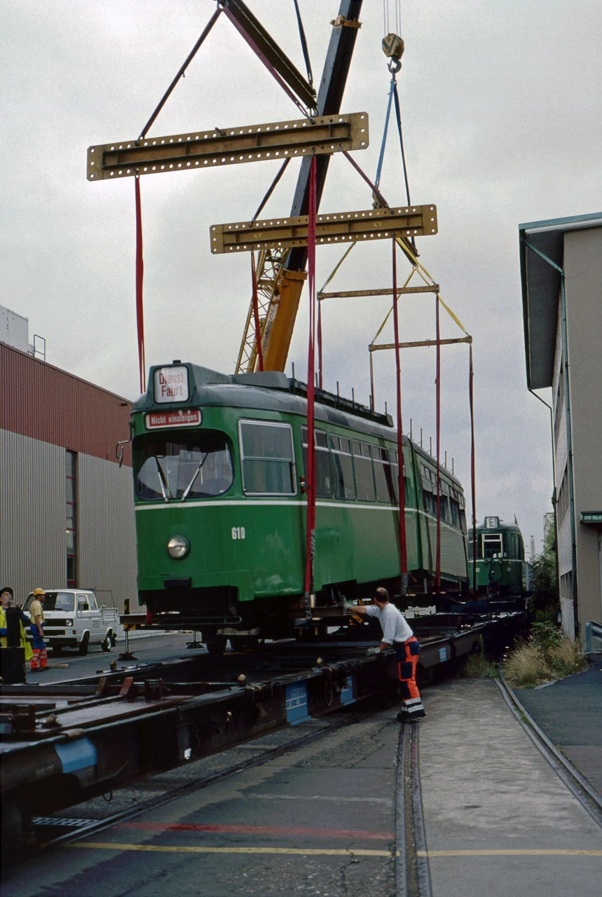 A tram on a railway flat wagon.