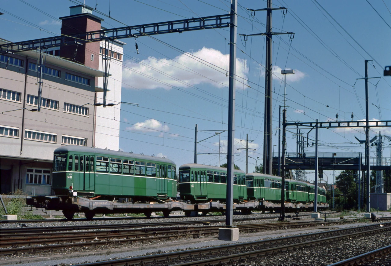 Trams on railway tracks.